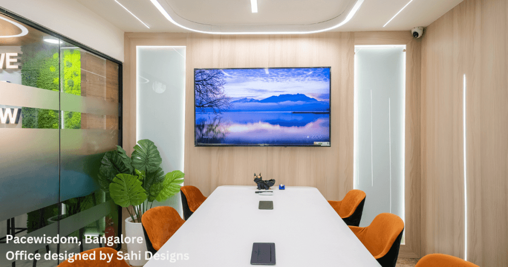 Brightly lit and thoughtfully designed conference room at Pacewisdom Bangalore
office, reflecting optimal lighting design by Sahi Designs.